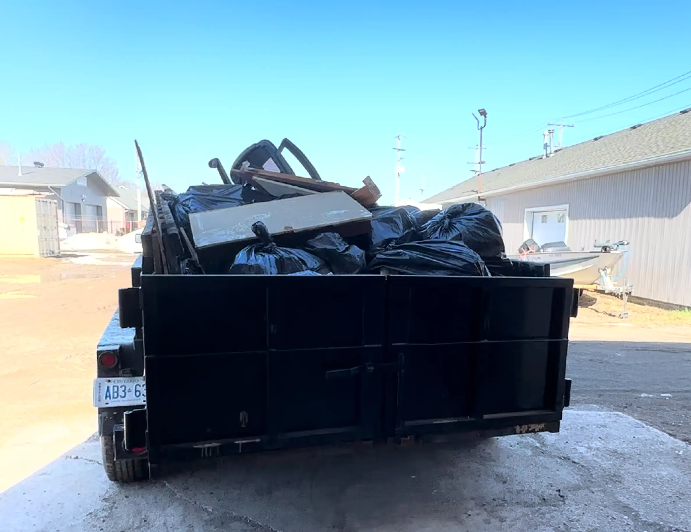 Residential junk removal trailer in Sault Ste. Marie